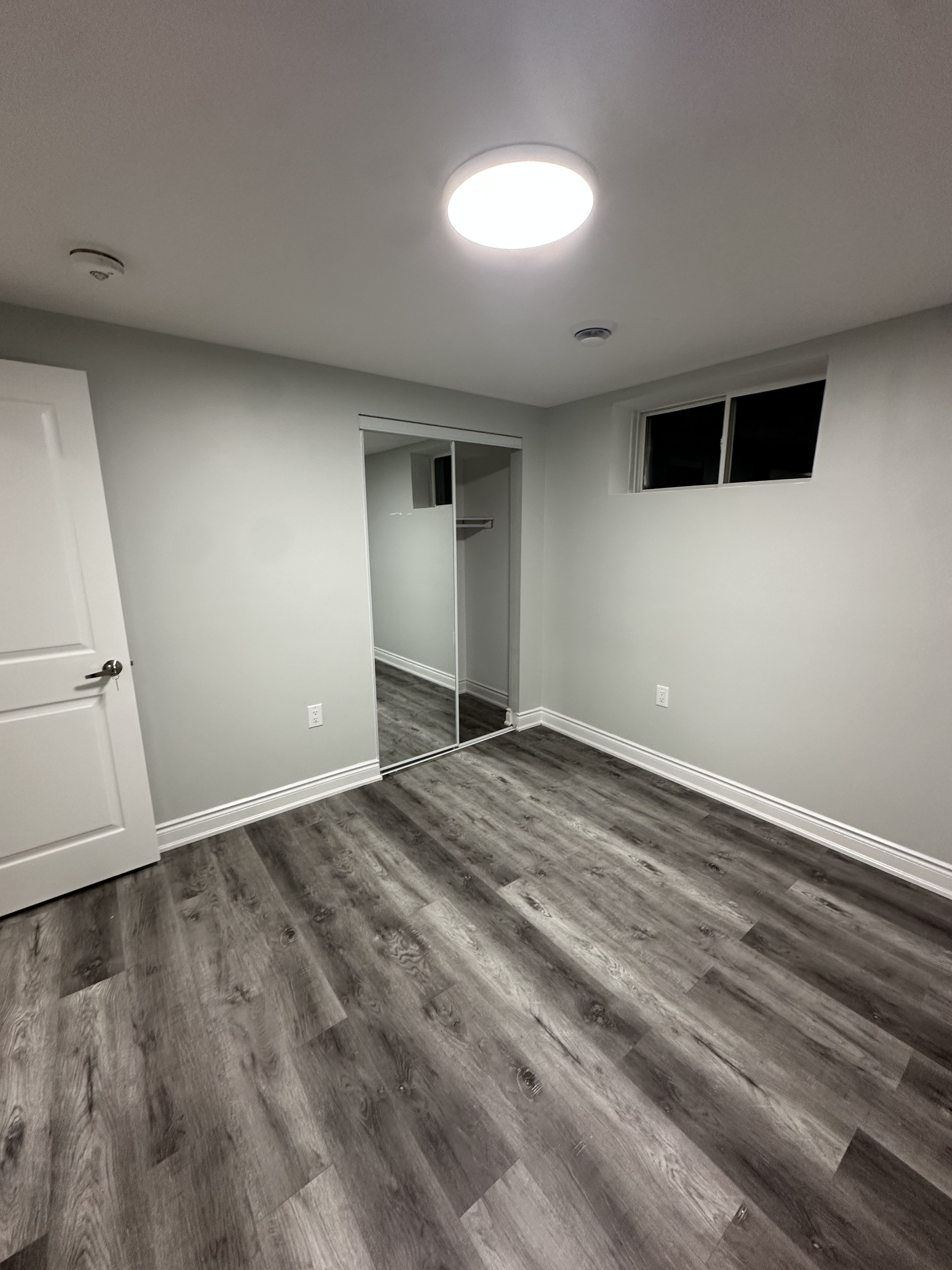 Basement Bedroom & Egress Window — Basements project by Redstone Construction in Brampton, ON
