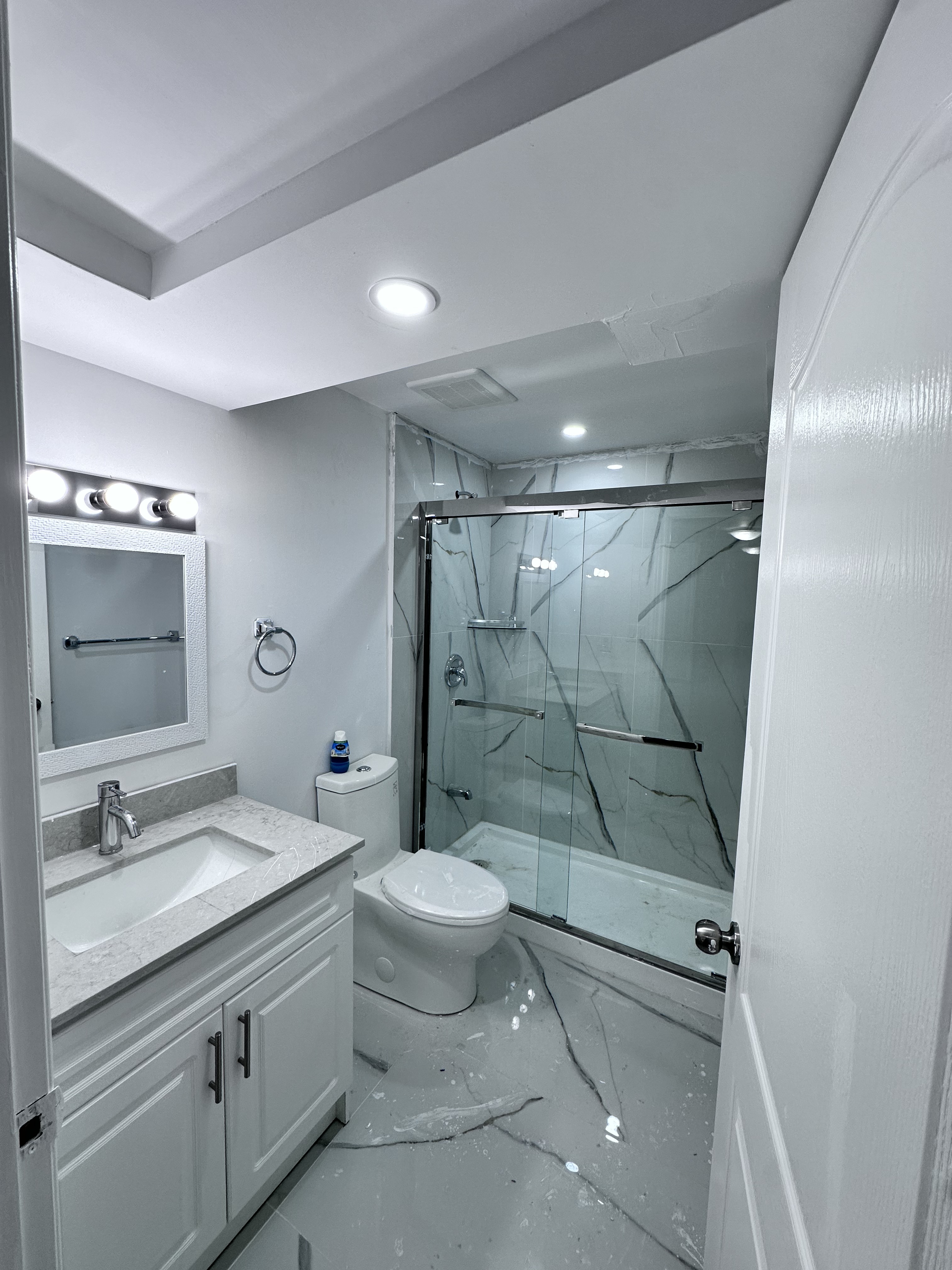 Basement Bathroom — Tiled Shower & Vanity — Basements project by Redstone Construction in Brampton, ON