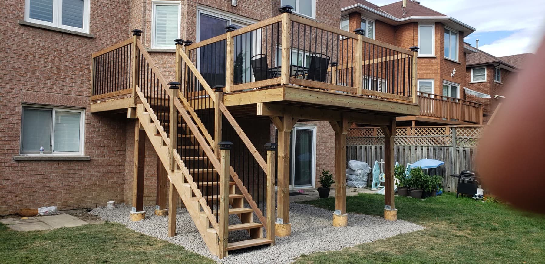 Two-Tier Cedar Deck & Stair Build — Decks project by Redstone Construction in Brampton, ON