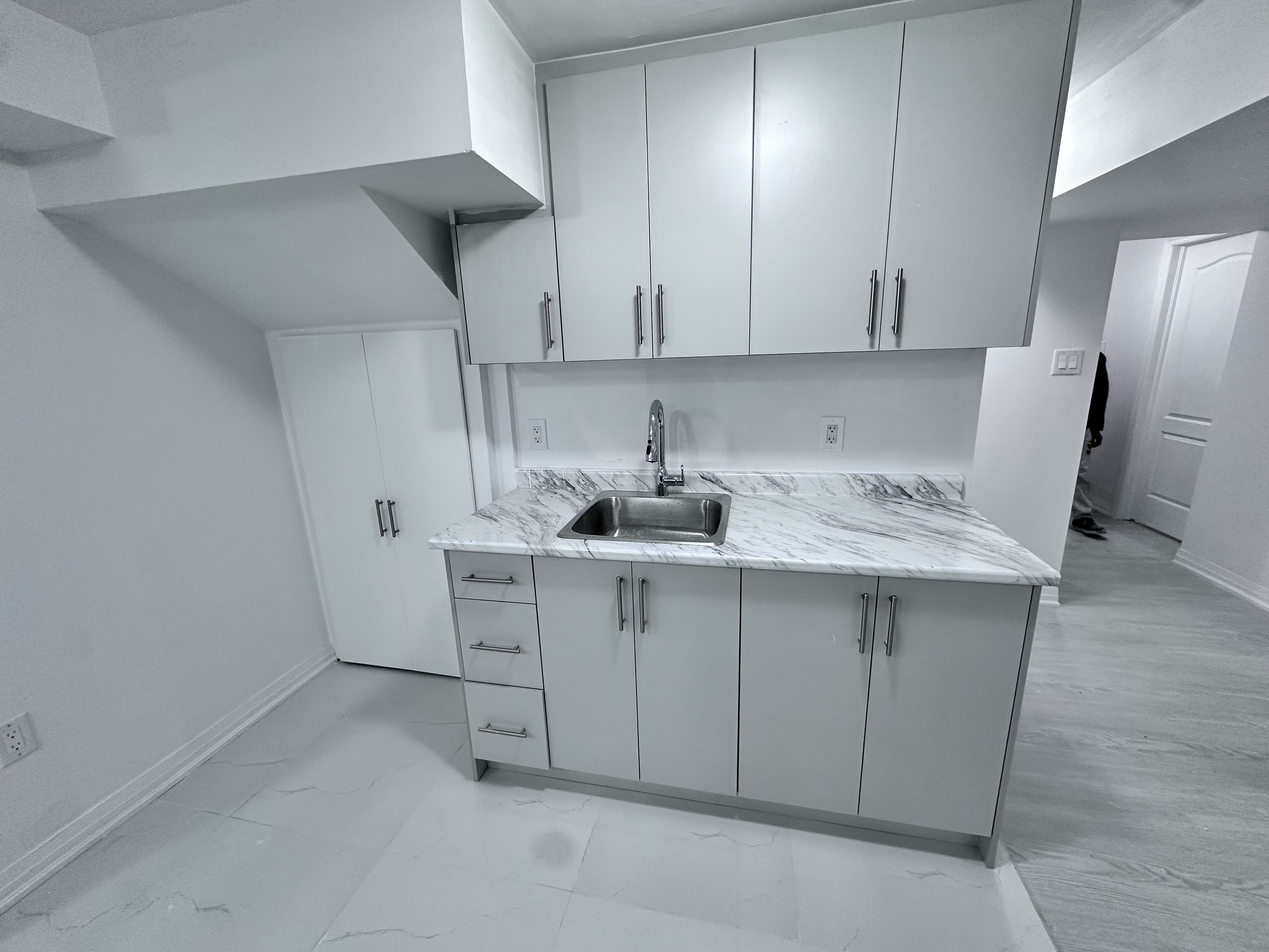 Basement Kitchenette & Storage Wall — Basements project by Redstone Construction in Brampton, ON